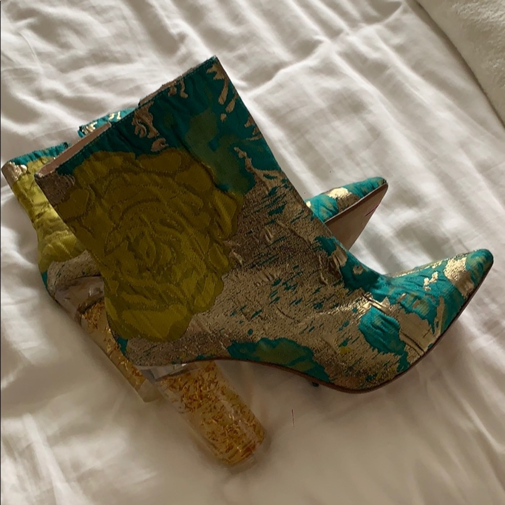 Raye iconic gold boot
